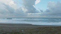 Beach In Sicily During Stormy Ocean Waves