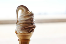 vanilla and chocolate swirl ice cream cone 