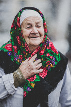 elderly woman wearing a scarf