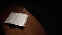 light shining on the pages of a Bible 