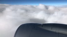 plane engine in the clouds 