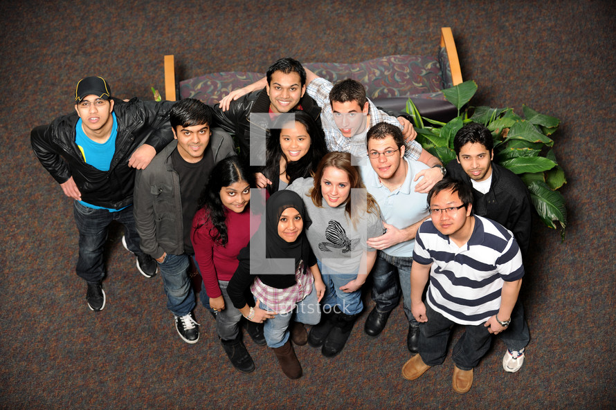group of young people of different ethic groups taken from above the group