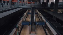Empty train station with escalator, France