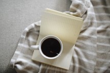 tea cup on a blanket 