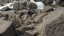 water flowing over rocks 