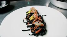Black Cuttlefish Ink Spaghetti Pasta With Shrimps And Cherry Tomato First Course