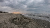 Sand castle on the beach on Langoog island, Germany - timelapse