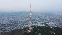 Transmit mast on a city hill