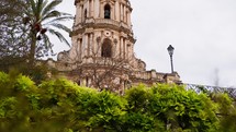 Foreign facade of a Christian church dome in Modica in Italy