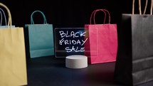 Black Friday advertising with shopping bags 