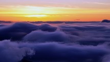 Timelapse of misty nature in magic morning sunrise with foggy clouds motion 