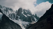 Clouds Over The Cerro Torre Mountain Peak With Glacier In El Chalten, Argentina. - handheld shot