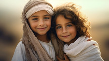 Two happy children from the Middle East sitting together in the golden hour. Peace and friendship concept