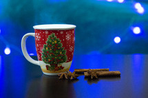 Christmas Mug with cinnamon sticks 