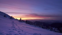 Colorful twilight over the winter mountain landscape, beautiful coloring, slow delay