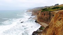Aerial Cinematic drone rugged coastline cliffs Santa Cruz Half Moon Bay Davenport Big Sur coastal Highway 1 California 