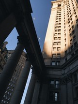 columns and skyscraper in NYC