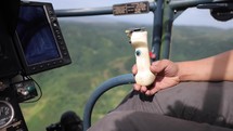 Asian Helicopter Pilot Flying In The Mountians Jungle Joystick