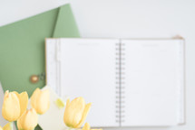 yellow tulips and planner 