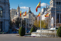 round-about and Metropolis Buildings in Madrid Spain