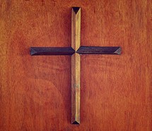 A wooden cross on a pulpit