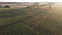 aerial view over rural farmland 