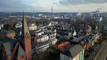 Drone pan from Evangelische Jugendkirche Wiesbaden to the Rhine River