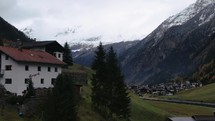 Aerial cinematic drone over mountain valley in Austria,