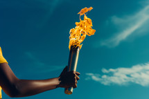 Athlete carries flaming sport torch at the opening ceremony