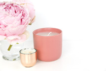 pink peony and candles 