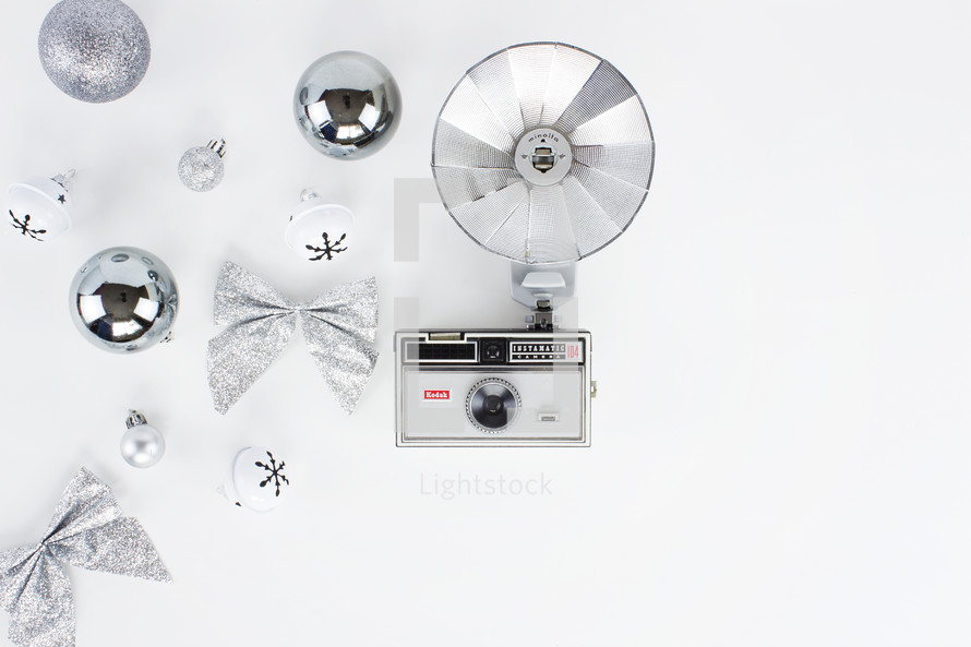 vintage flash camera and holiday decorations 