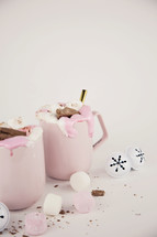 pink mugs and Christmas ornaments 