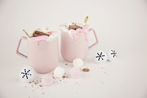 pink mugs and Christmas bells 