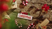 Merry Christmas text on wooden table background