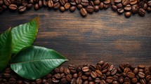 Coffee beans with leaves on a rustic wood background with room for copy