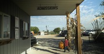 Admissions, ticket booth at Halloween Pumpkin Patch in autumn, fall season.