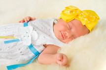 smiling sleeping infant girl