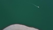 Boat In The Sea By The Shore Top Aerial View