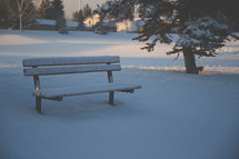 snow on a bench 