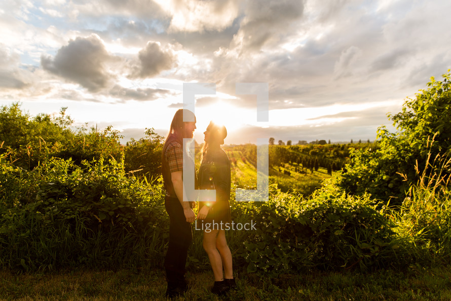 couple standing together outdoors 