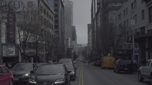 cars on a busy city street 