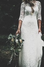 bride in a lace wedding gown 