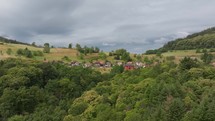 Aerial footage showcasing a quaint German town, highlighting various house designs amid greenery