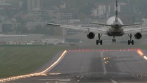 Airplane landing on runway