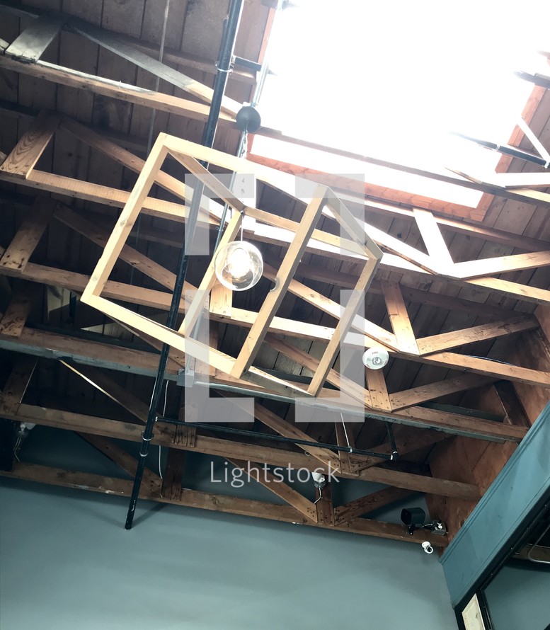 lamps on wooden ceiling beams 