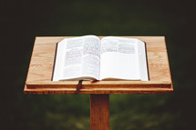Bible on a podium outdoors 