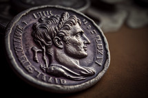 A Denarius coin featuring Caesar Tiberius — Give to Caesar what belongs to Caesar – and to God what belongs to God (Matthew 22:15-21)
