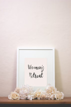 word women's retreat in a frame