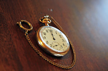 Vintage Pocket Watch on Wood (Shallow Depth of Field)