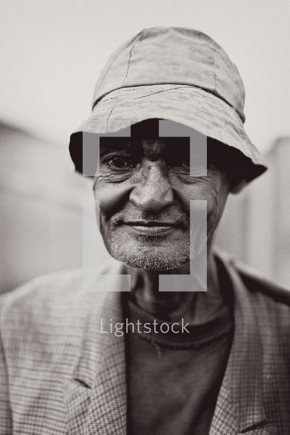 elderly man in a hat